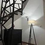 Una *